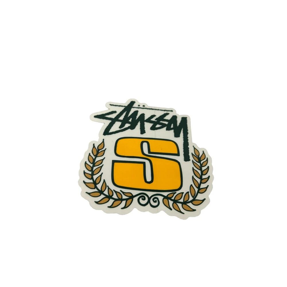 Stüssy Yellow Crest Logo Sticker – Classic Graphic Decal – New
